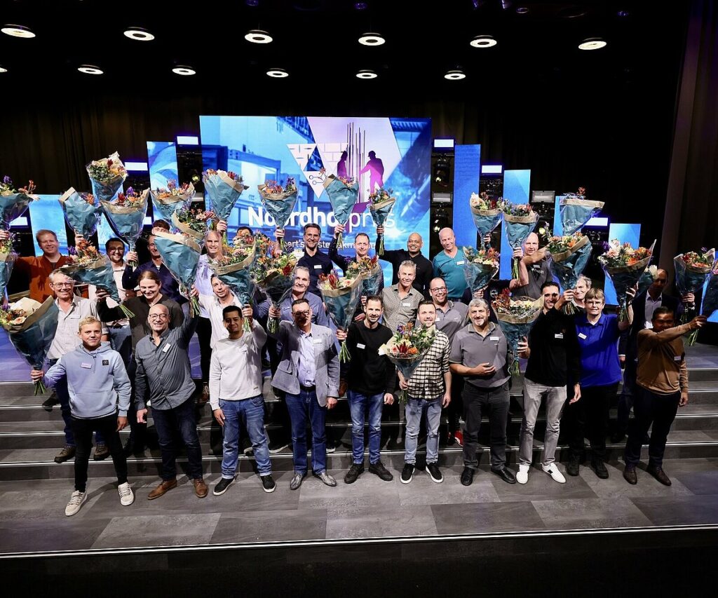 De winnaars van de Noordhofprijs samen op het podium